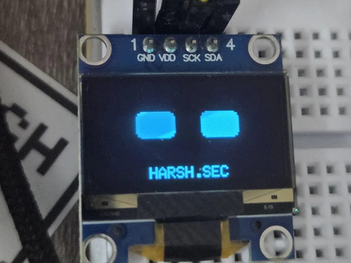Idle screen with two pixel eyes and HARSH.SEC